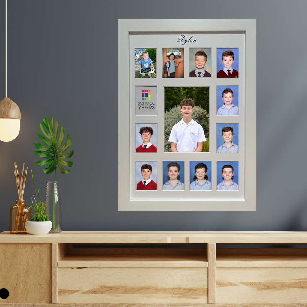 Decorative photo frame with multiple square pockets and a motivational quote on a light background.

