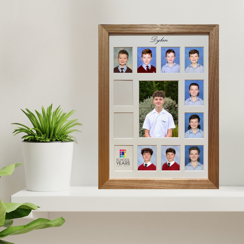 Personalised large oak school years photo frame displaying Reception to Year 12 school photos with graduation portrait